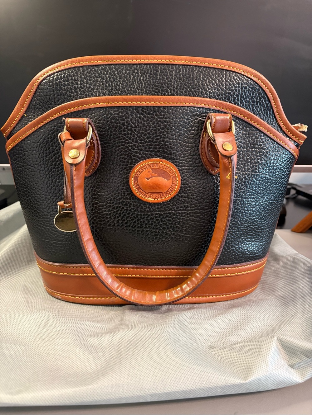 Dooney & Bourke All Weather Leather Navy Pebble Leather Satchel with Brown Trim